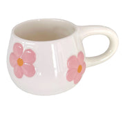 Taza de cerámica con relieve de flores en rosa pastel Pipa and Happy