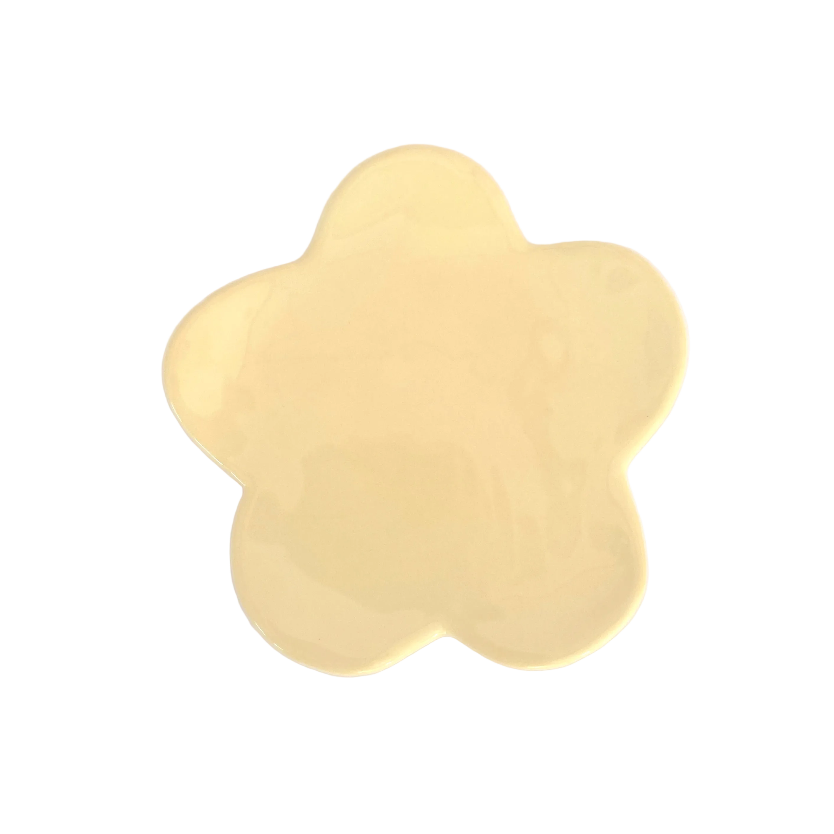 plato de cerámica con forma de flor color amillo pastel 