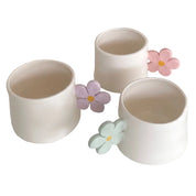 tazas de cerámica hecha a mano con asa de flor en tonos pasteles