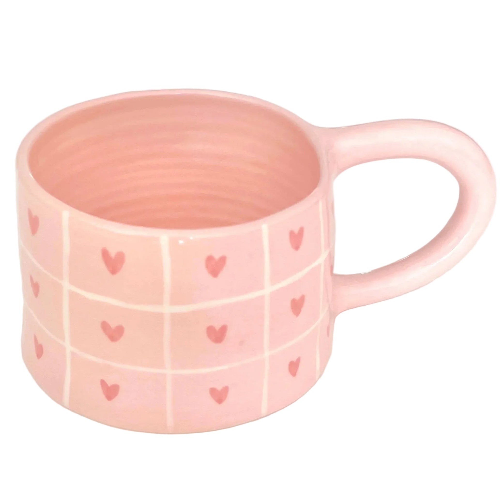 Taza con rayas y corazones pintados a mano en color rosa pastel.
Perfecta para cafés  y matcha latte