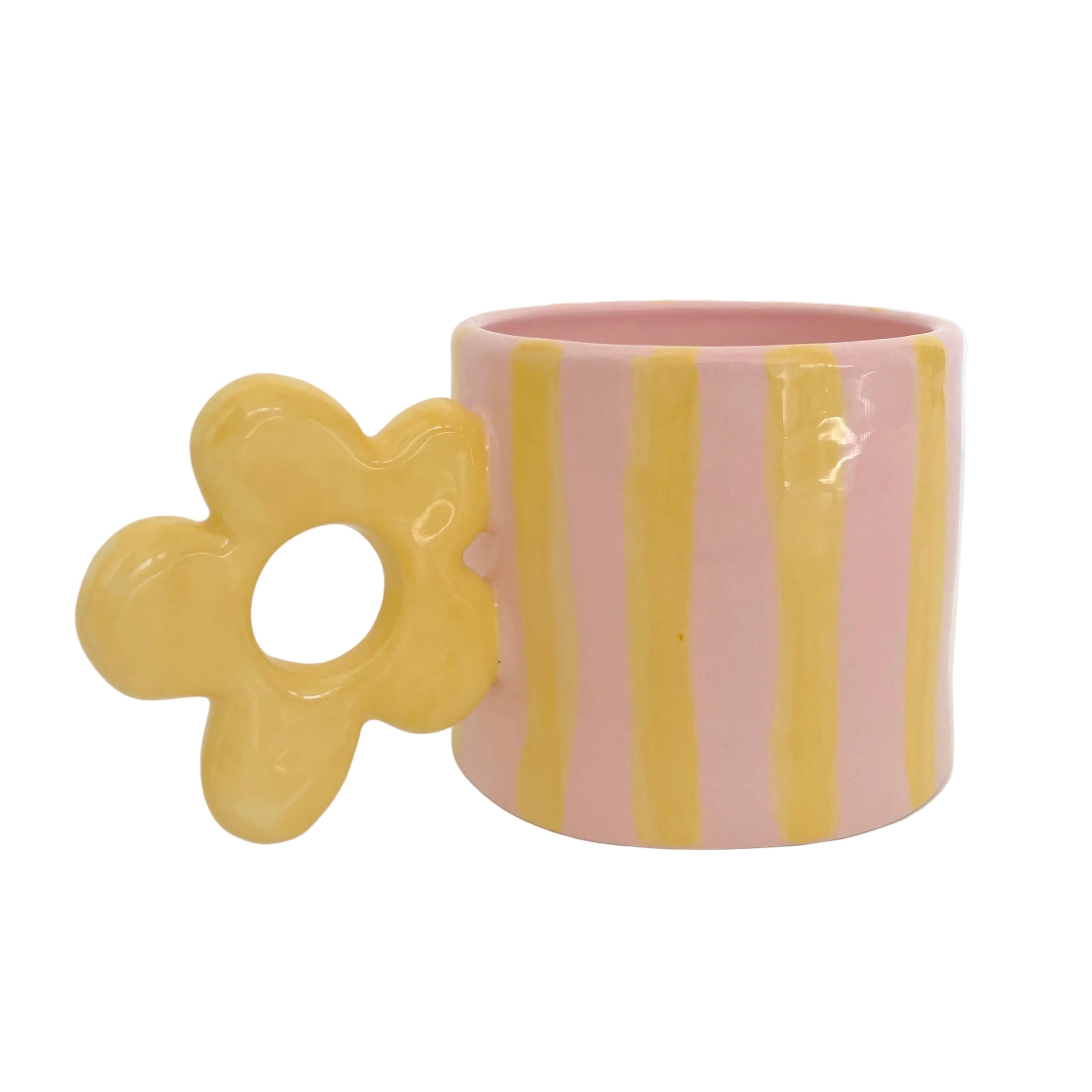 taza de cerámica con asa de flor y rayas a amarillas y rosas hecha a  mano 