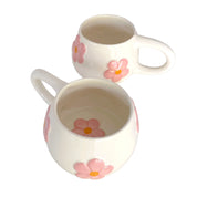 tazas con flores en relieve de color rosa pastel 